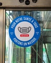 Mandatory mask sticker in Paris metro during the covid-19 epidemic