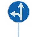 Mandatory straight or left turn ahead, traffic lane route direction sign pointer road sign, choice concept, blue isolated roadside Royalty Free Stock Photo