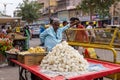 Man vendor selling sweet in a busy road in Mandawa