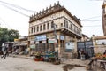 Mandawa, Rajasthan, India: Indian street life with fruit sellers and an old haveli of Mandawa