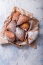 Mandazi is a slightly sweet East African Street Food; Horizontal top view from above