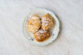 Mandazi is a slightly sweet East African Street Food; spicy, airy yeast doughnut dough made with coconut milk, flavored with Royalty Free Stock Photo