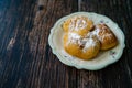 Mandazi is a slightly sweet East African Street Food; spicy, airy yeast doughnut dough made with coconut milk, flavored with Royalty Free Stock Photo