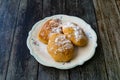 Mandazi is a slightly sweet East African Street Food; spicy, airy yeast doughnut dough made with coconut milk, flavored with