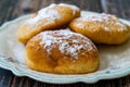 Mandazi is a slightly sweet East African Street Food; spicy, airy yeast doughnut dough made with coconut milk, flavored with