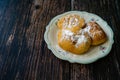 Mandazi is a slightly sweet East African Street Food; spicy, airy yeast doughnut dough made with coconut milk, flavored with