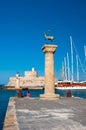 Mandraki harbor and bronze deer statues, Greece