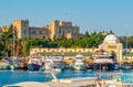 Mandraki harbor with Rhodes fortress and New market (Nea Agora), Rhodes, Greece