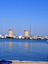 Mandraki Harbour on the Greek island of Rhodes. Royalty Free Stock Photo