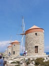 Mandraki Harbour on the Greek island of Rhodes. Royalty Free Stock Photo
