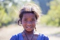 Portrait poor girl on the street in Indian village Mandu, India