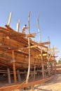 MANDVI, GUJARAT, INDIA - DECEMBER 21, 2013: Traditional wooden Dhow building