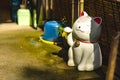 Maneki Neko beckoning cat a common Japanese Figurine Royalty Free Stock Photo