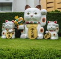 Maneki-Neko japan lucky cat in front of Gateway Ekamai department store, Bangkok