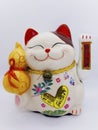 Maneki-neko is name of lucky cat, Symbolizing lucky and wealthy. Royalty Free Stock Photo