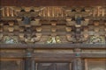 Manekineko cat and astrological signs carved on the pagoda of gotokuji temple.