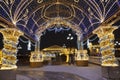 Manezhnaya square during New Year and Christmas holidays with glowing multi-colored arch, Moscow