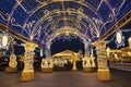 Manezhnaya square during New Year and Christmas holidays with glowing multi-colored arch, Moscow,