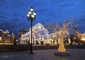 Manezhnaya square during New Year and Christmas holidays with glowing multi-colored arch and trees at night, Moscow Royalty Free Stock Photo