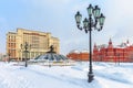 Manezhnaya Square under snow in Moscow. Panoramic view of the snowy Moscow center in frosty winter