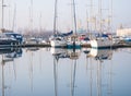 Mangalia, Romania - 02.24.2021: Many boats and yachts anchored at the touristic port or harbor in Mangalia, Constanta Royalty Free Stock Photo