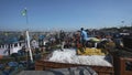 MANGALORE, INDIA -2011: Fishermen transferring fish catch from sea to trucks on October