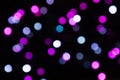 Mangent, pink, white and gray blurred confetti of lights on a black background Royalty Free Stock Photo