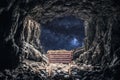 Manger in a cave under a bright starry sky during the birth of Jesus Christ Royalty Free Stock Photo