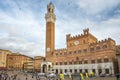 Mangia Tower and Palazzo Pubblico Town Hall at the Piazza del Campo, Siena, Italy Royalty Free Stock Photo