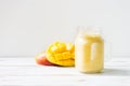 Mango, Banana, Pineapple and Oatmeal Smoothie in the Jar Royalty Free Stock Photo