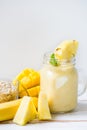 Mango, Banana, Pineapple and Oatmeal Smoothie in the Jar Royalty Free Stock Photo