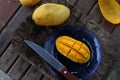 Mango on chopping board