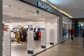 MANGO clothing store in the Galleria shopping center. Logo and view inside the store. Minsk, Belarus, 2022