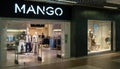 MANGO clothing store in shopping center. Logo and view inside the store. Minsk, Belarus, 2023