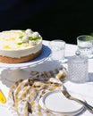 Mango and coconut cake on cake stand