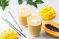 Mango Coconut Papaya Tropical Fruit Smoothie In Drinking Glass Royalty Free Stock Photo