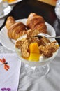 Mango croissant and cornflakes delicious breakfast Royalty Free Stock Photo