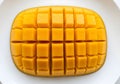 Mango Cubes Arranged on White Plate Overhead Royalty Free Stock Photo