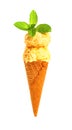 a mango flavor ice cream cone with two balls with fresh leaves on white