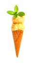 a mango flavor ice cream cone with two balls with fresh leaves on white Royalty Free Stock Photo