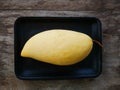 Mango Fruit basket.organic healthy fruit on wood table