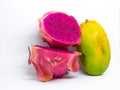 Mango fruit and dragon fruit slices on white background isolated. Royalty Free Stock Photo