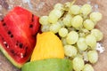 Mango with green grape with water melon fruits