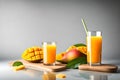 mango juice with mango slice isolated on white background. slice of mangoes decorated on the wooden table