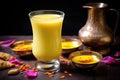 mango lassi poured in a traditional indian glass