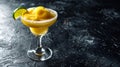 This mango margarita, rimmed with salt, captures the essence of summer with its slushy texture and zesty lime garnish