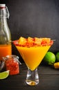 Mango Margarita with a Turmeric Chili Twist and Mango Garnish