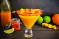 Mango Margarita with a Turmeric Chili Twist and Mango Garnish