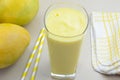 Mango milkshake in a glass cup Royalty Free Stock Photo