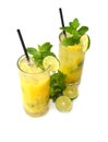 Mango mojito in hMango mojito in highball glass with sliced lime isolated on white background Royalty Free Stock Photo